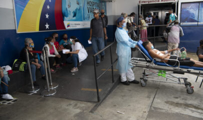 Patients waiting at the entrance to the emergency room at Vargas hospital in Caracas