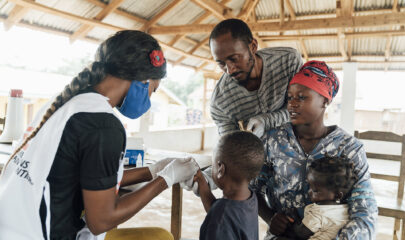MSF staff test a boy for malaria, one of the deadliest diseases for children under five in Sierra Leone.