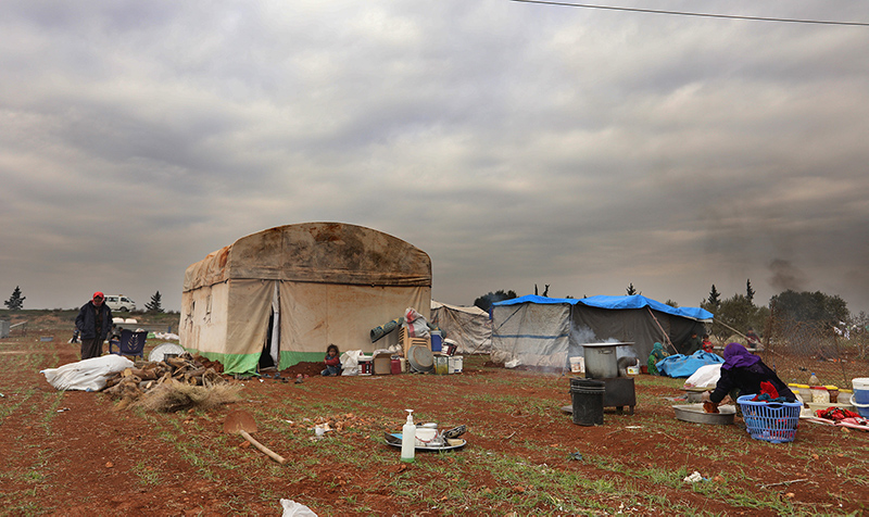 Fleeing intense airstrikes in northwest Syria, internally displaced people created makeshift shelters.